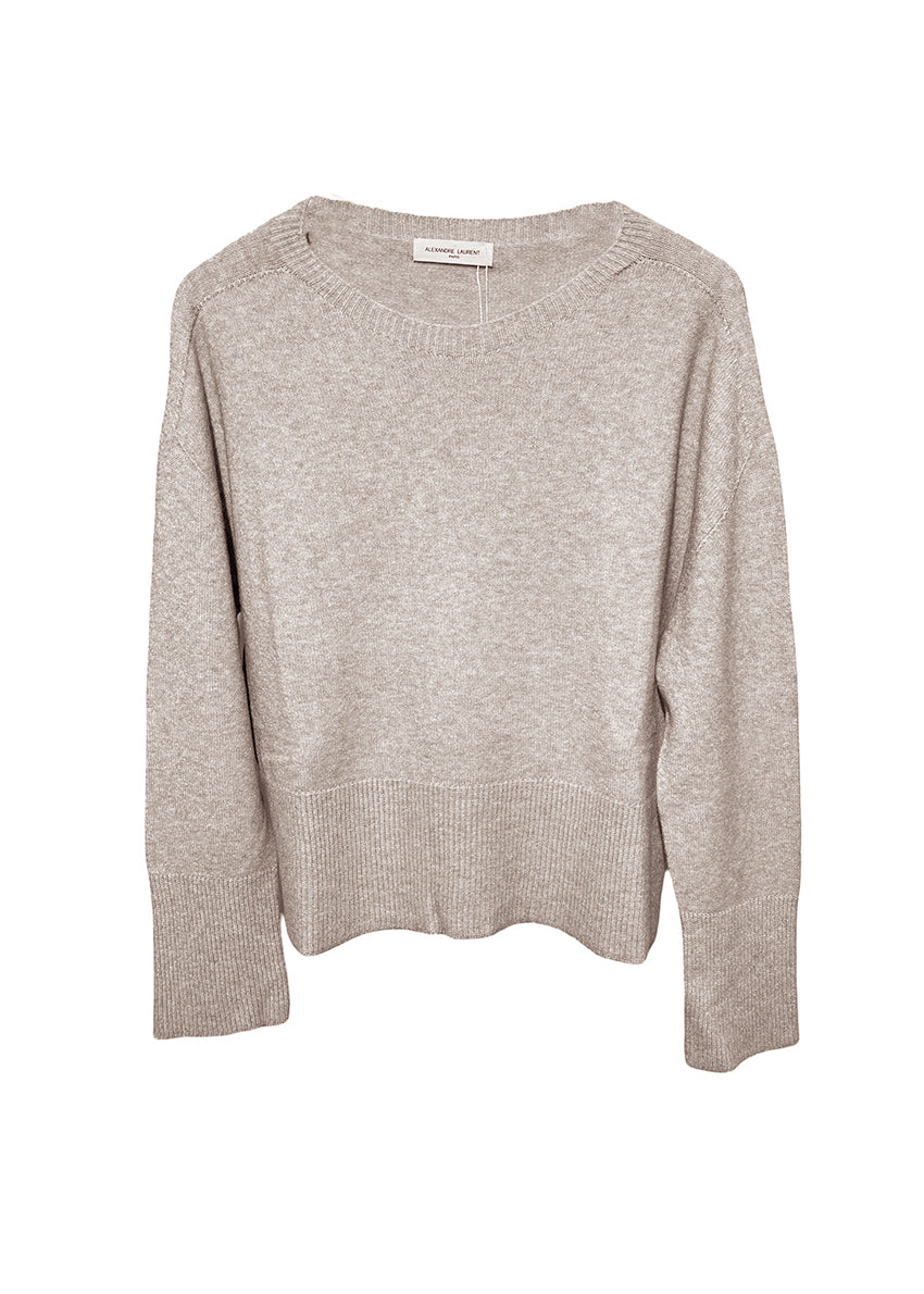 Tan sweater on a white background