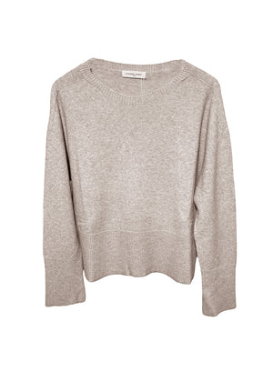 Tan sweater on a white background
