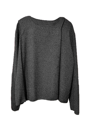 A gray unisex top with a crepe texture, featuring a relaxed fit with slightly dropped shoulders and diagonal seams along the upper sleeves.