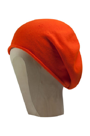 Hot orange beanie beret on a white background 