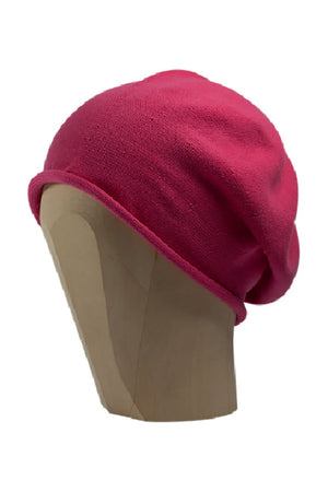 Pink beanie beret on a white background 