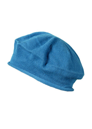 Blue beanie beret on a white background 