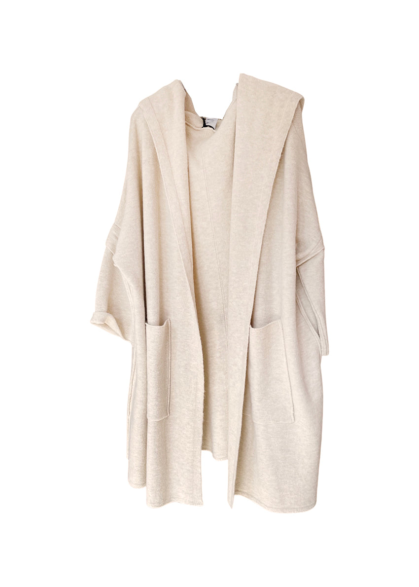 A beige long cardigan from the front on a white background 