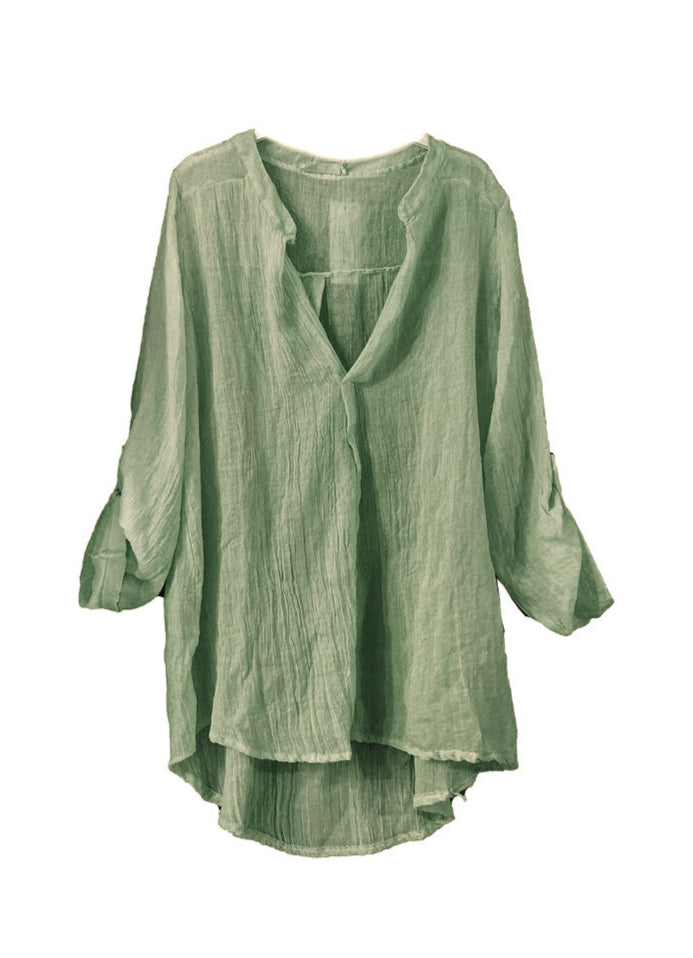 A khaki shirt on a white background 