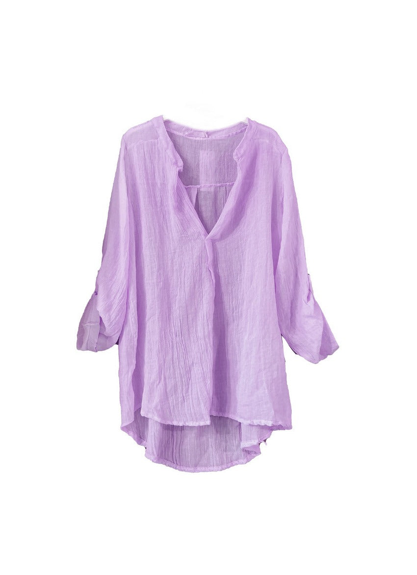 A lila shirt on a white background 