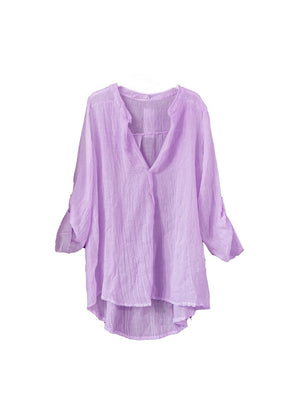 A lila shirt on a white background 