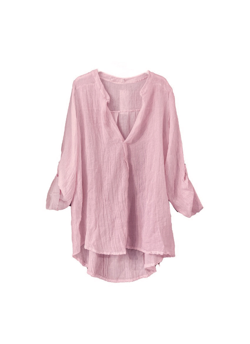 A rosy brown shirt on a white background 