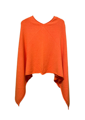 A orange poncho on a white background 