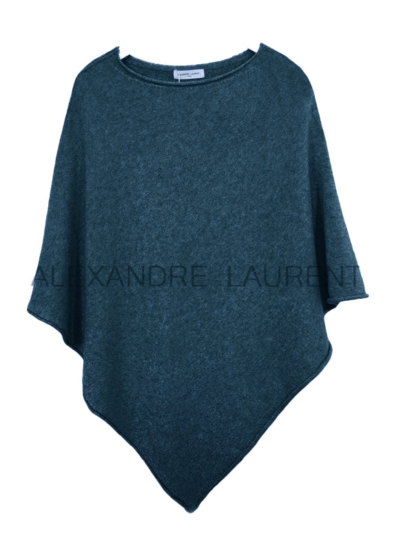 A teal poncho on a white background 