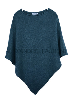 A teal poncho on a white background 