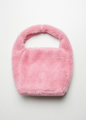 Furry pink purse made of wool blend fabric. A fashion statement design, it closes with a metallic clasp and it is fully lined.