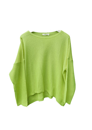 Yellow green sweater on a white background 
