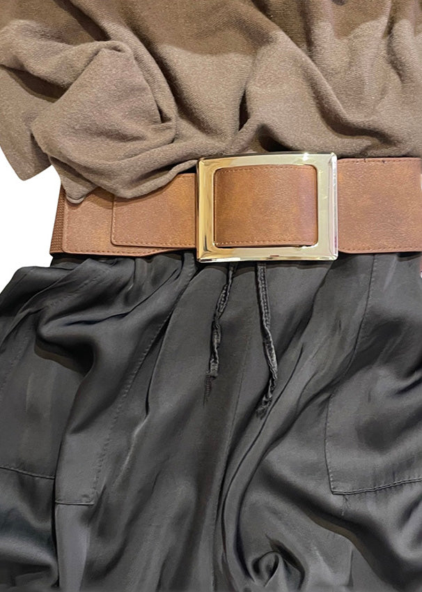 Black Elasticated belt with a square gold polish buckle