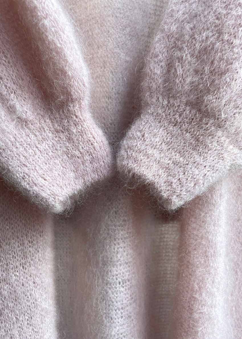 A close up photo from a mohair long cardigan
