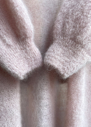 A close up photo from a mohair long cardigan