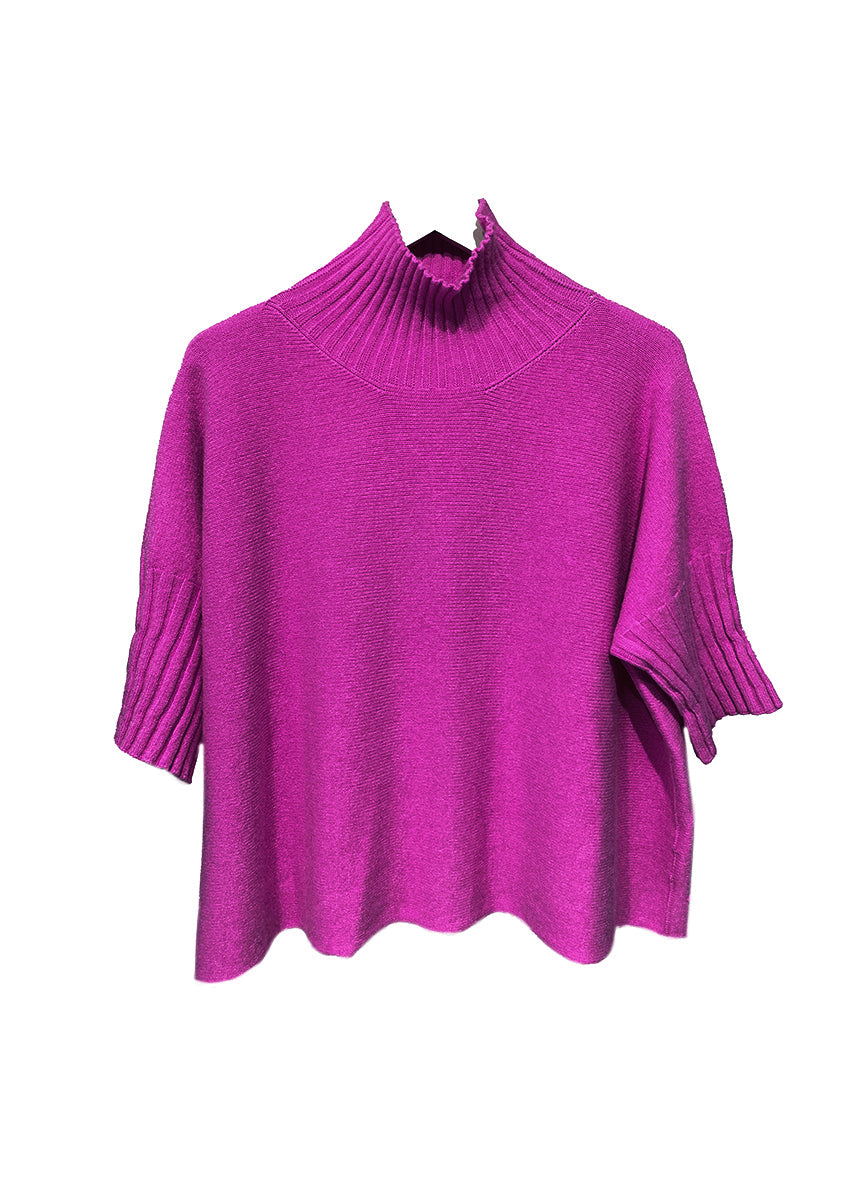 A very simple medium violet red sweater with ribbed sleeves texture and turtle neck, the vertical ribs makes it classy and comfortable. Very easy to wear, medium length, this sweater is for intermediate spring/ autumn days.