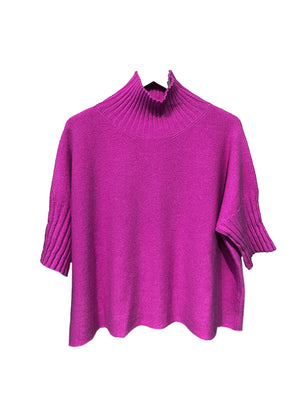 A very simple medium violet red sweater with ribbed sleeves texture and turtle neck, the vertical ribs makes it classy and comfortable. Very easy to wear, medium length, this sweater is for intermediate spring/ autumn days.