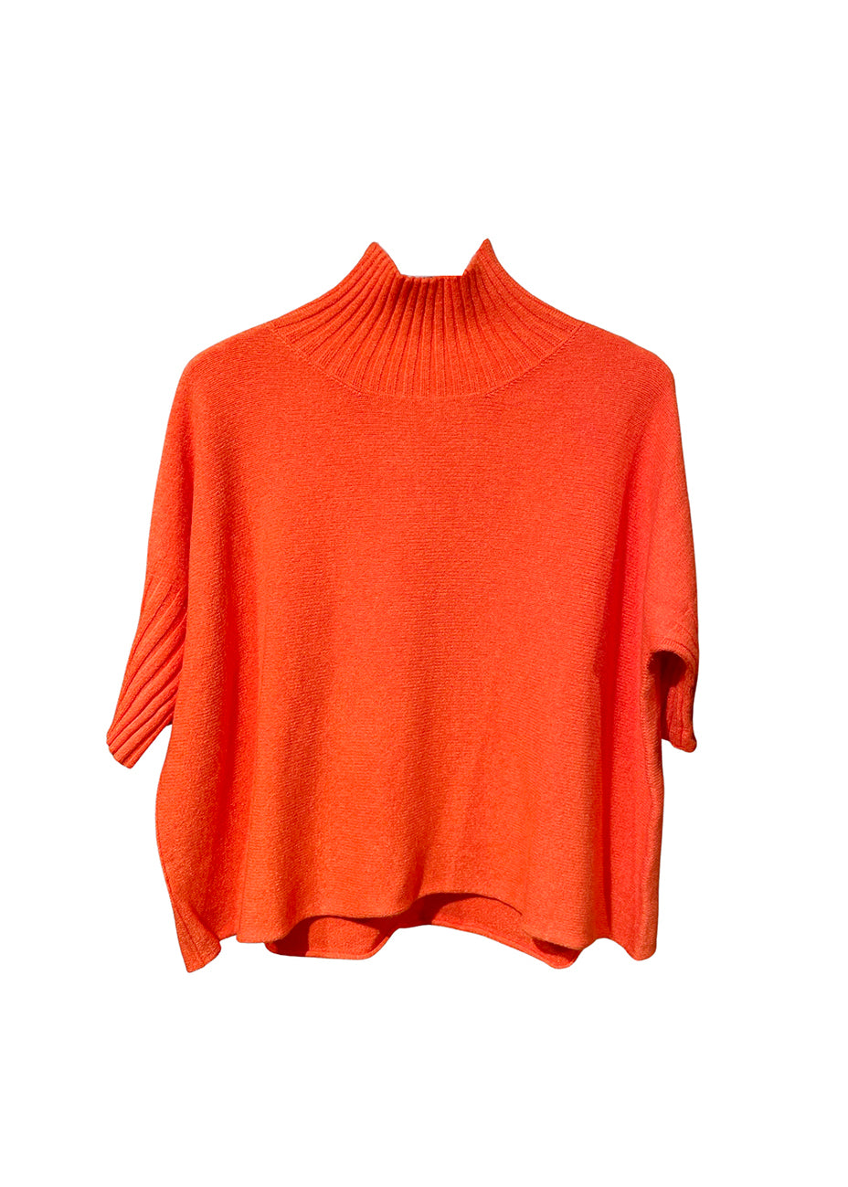 A very simple orange sweater with ribbed sleeves texture and turtle neck, the vertical ribs makes it classy and comfortable. Very easy to wear, medium length, this sweater is for intermediate spring/ autumn days.