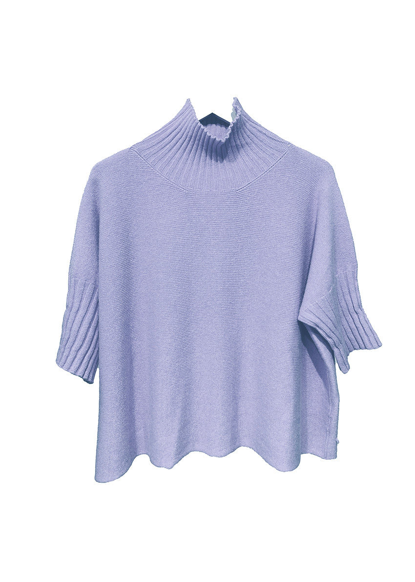 A very simple steel blue sweater with ribbed sleeves texture and turtle neck, the vertical ribs makes it classy and comfortable. Very easy to wear, medium length, this sweater is for intermediate spring/ autumn days.