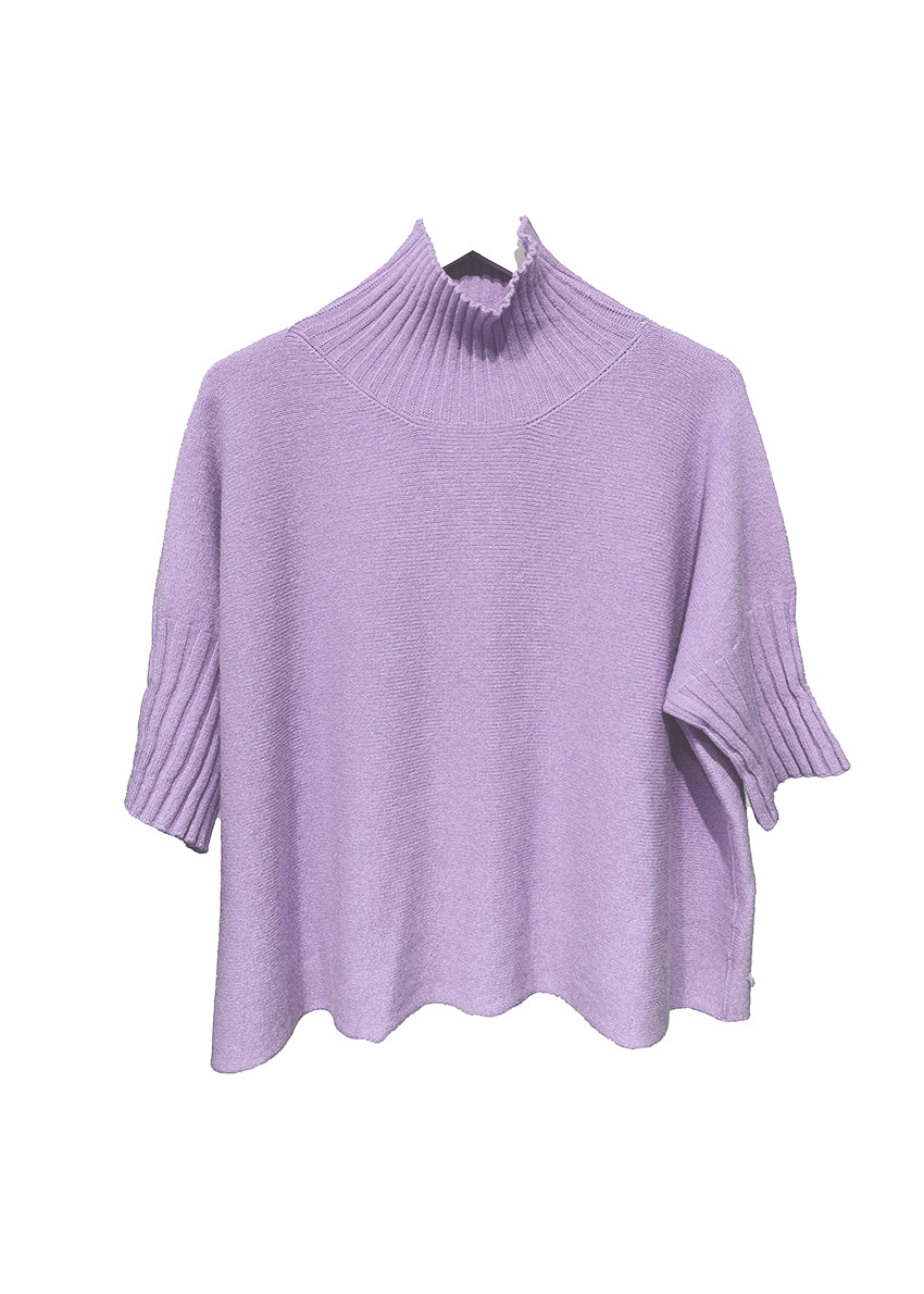 A purple sweater with ribbed sleeves and a turtle neck.