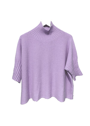 A purple sweater with ribbed sleeves and a turtle neck.