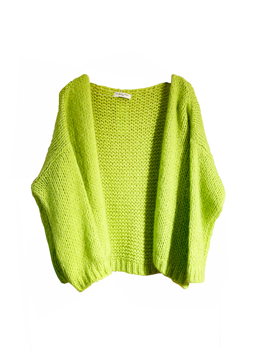 A yellow green knit cardigan on a white background 
