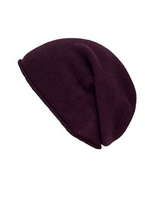 A black wool beanie on a white background