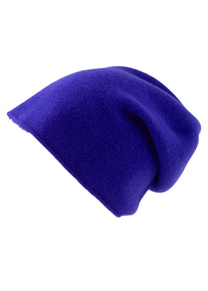 A blue wool beanie on a white background 