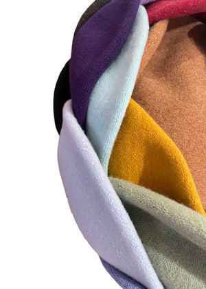 A diferent colours of a wool beanies