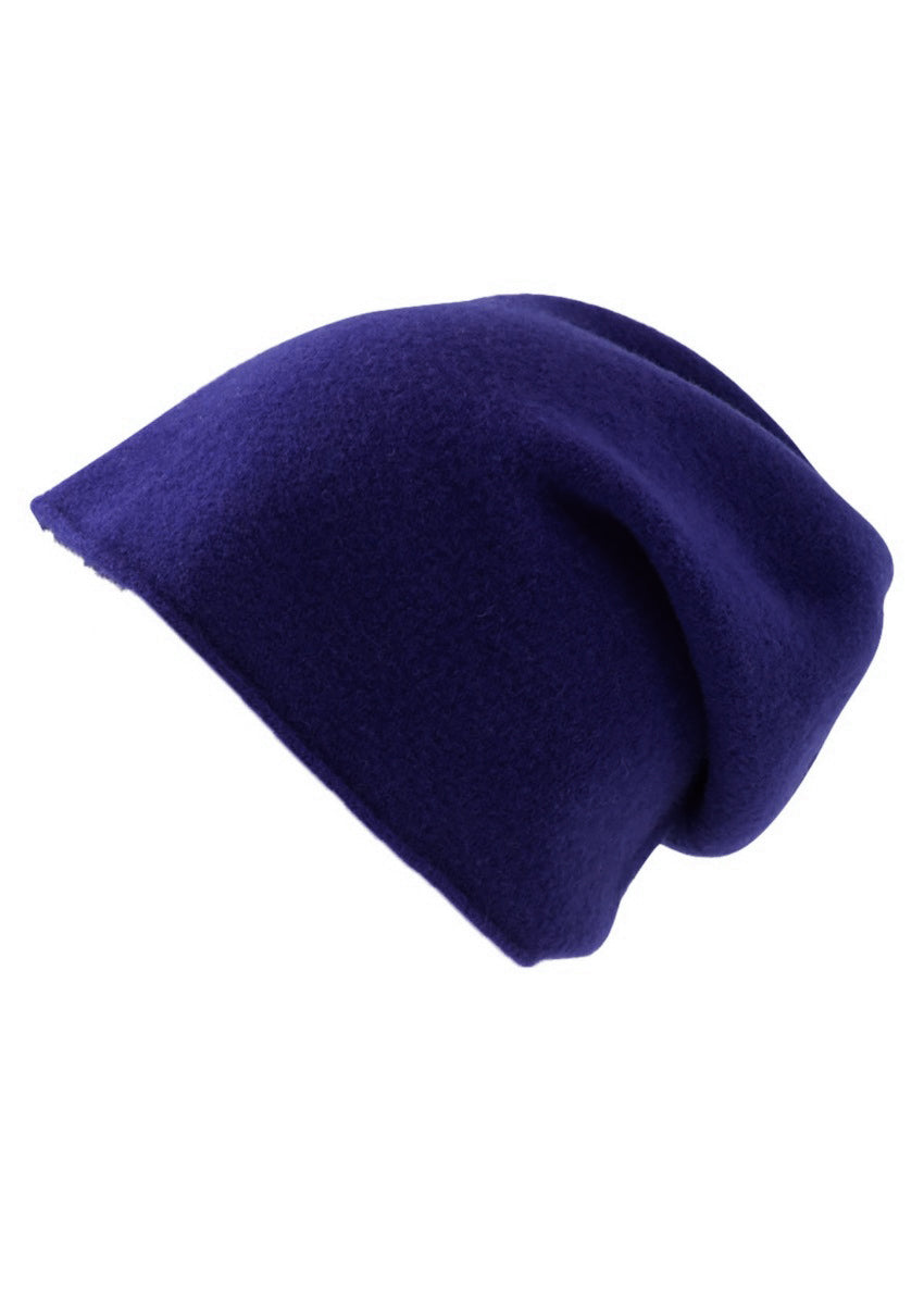 A midnight blue wool beanie on a white background 