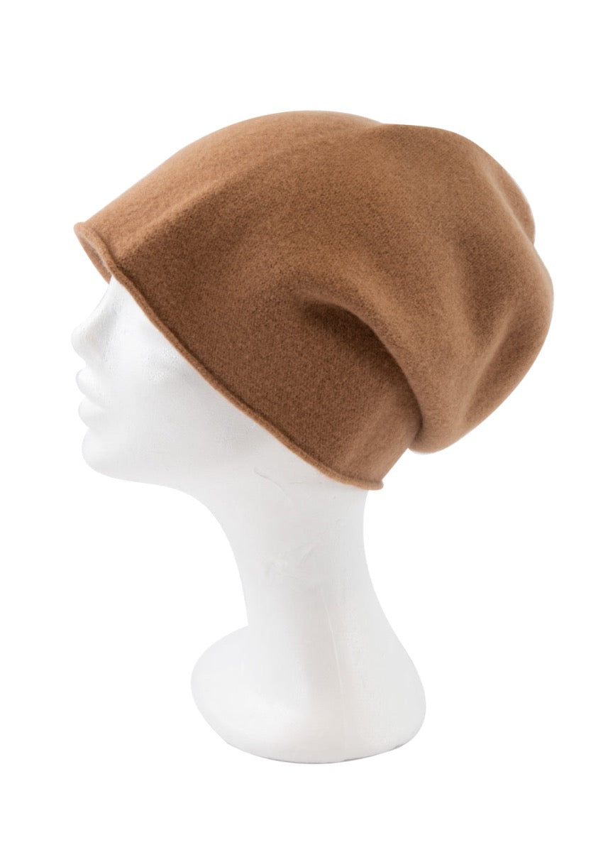 A peru wool beanie on a white background 
