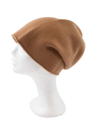 A peru wool beanie on a white background 