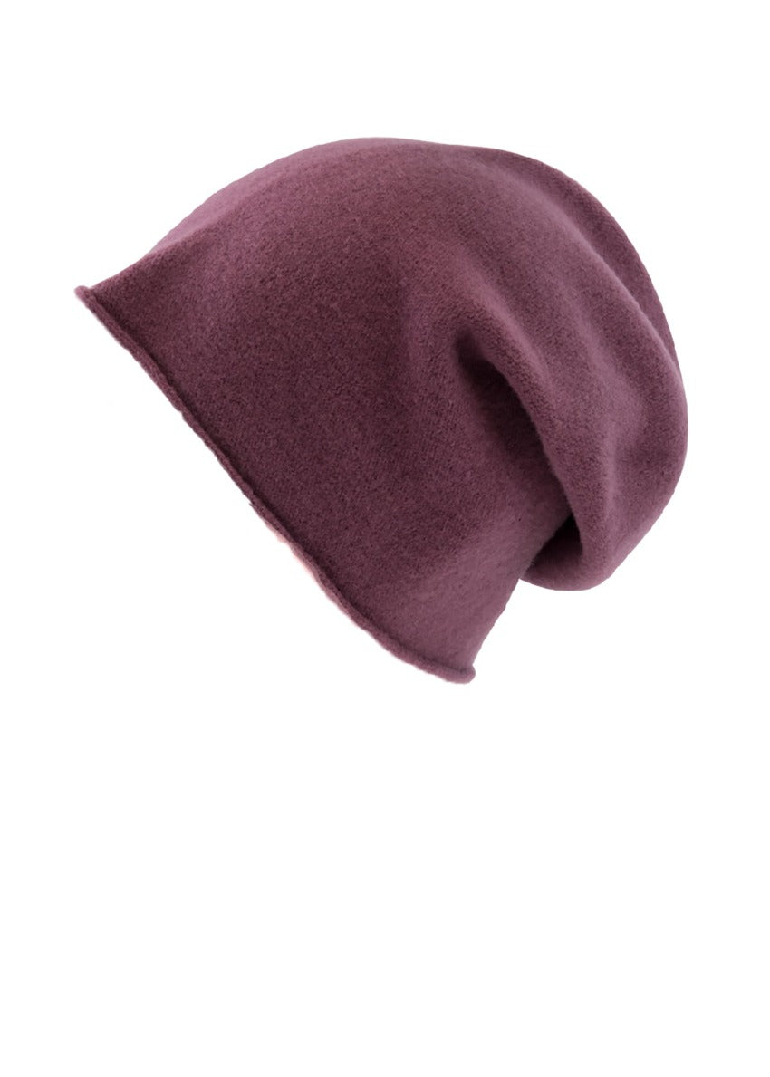A brown wool beanie on a white background 