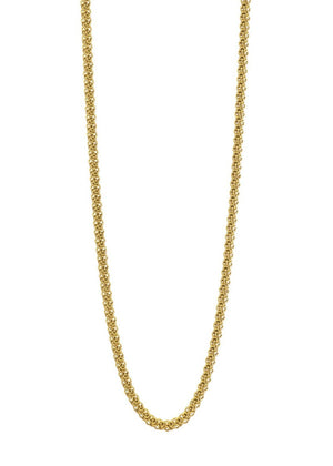 A gold necklace on a white background 