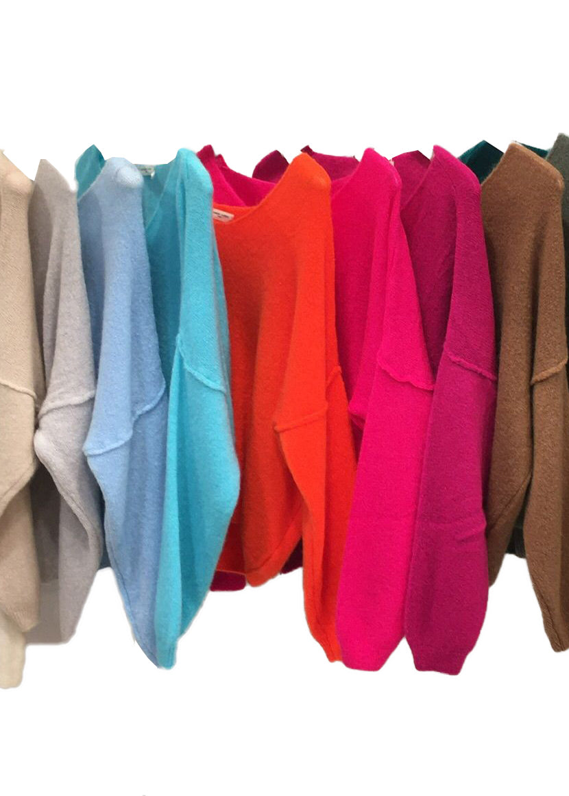 Colourful , loose-fitting, long-sleeved sweater with a deep V neckline.