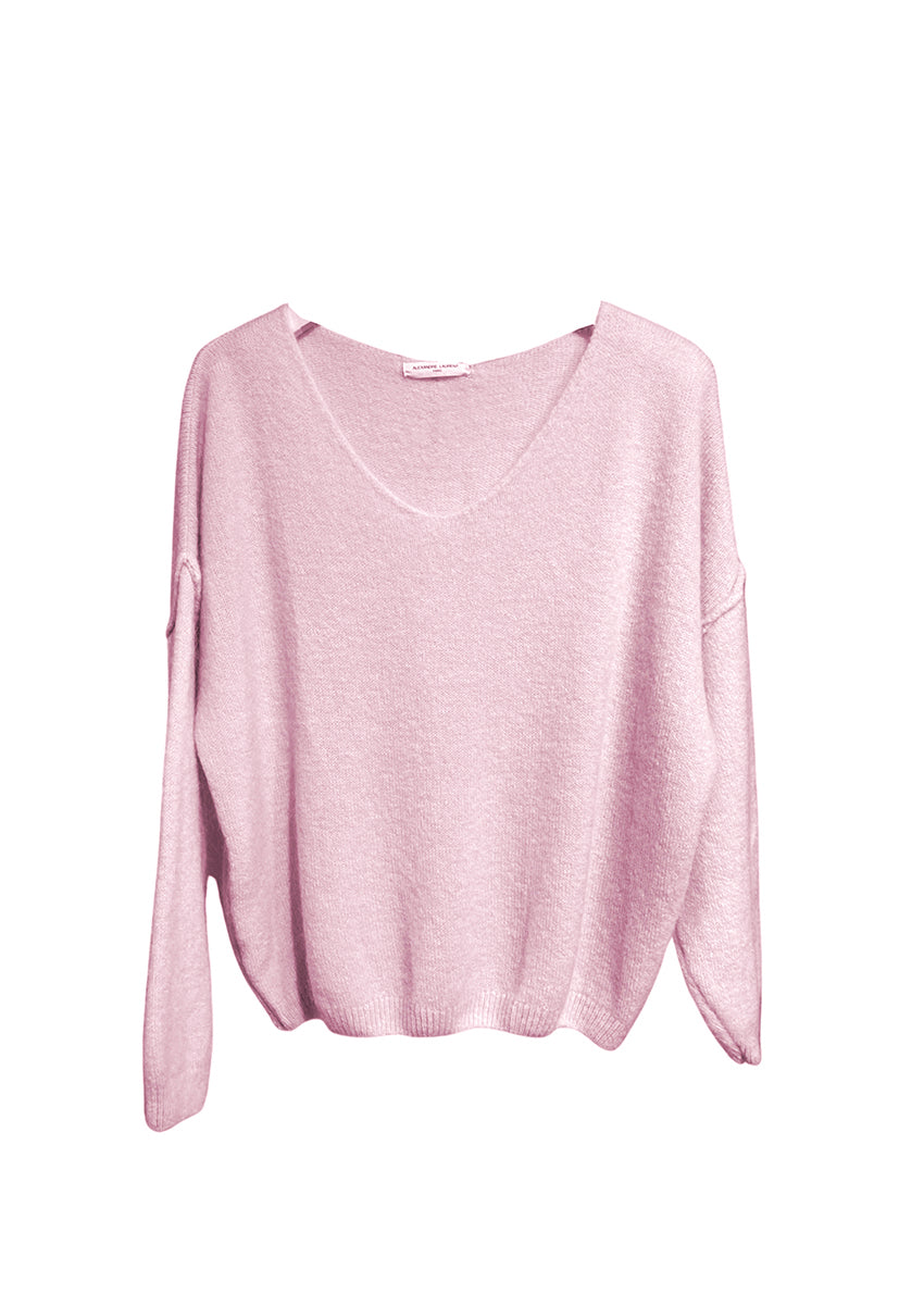A pink, loose-fitting, long-sleeved sweater with a deep V neckline.