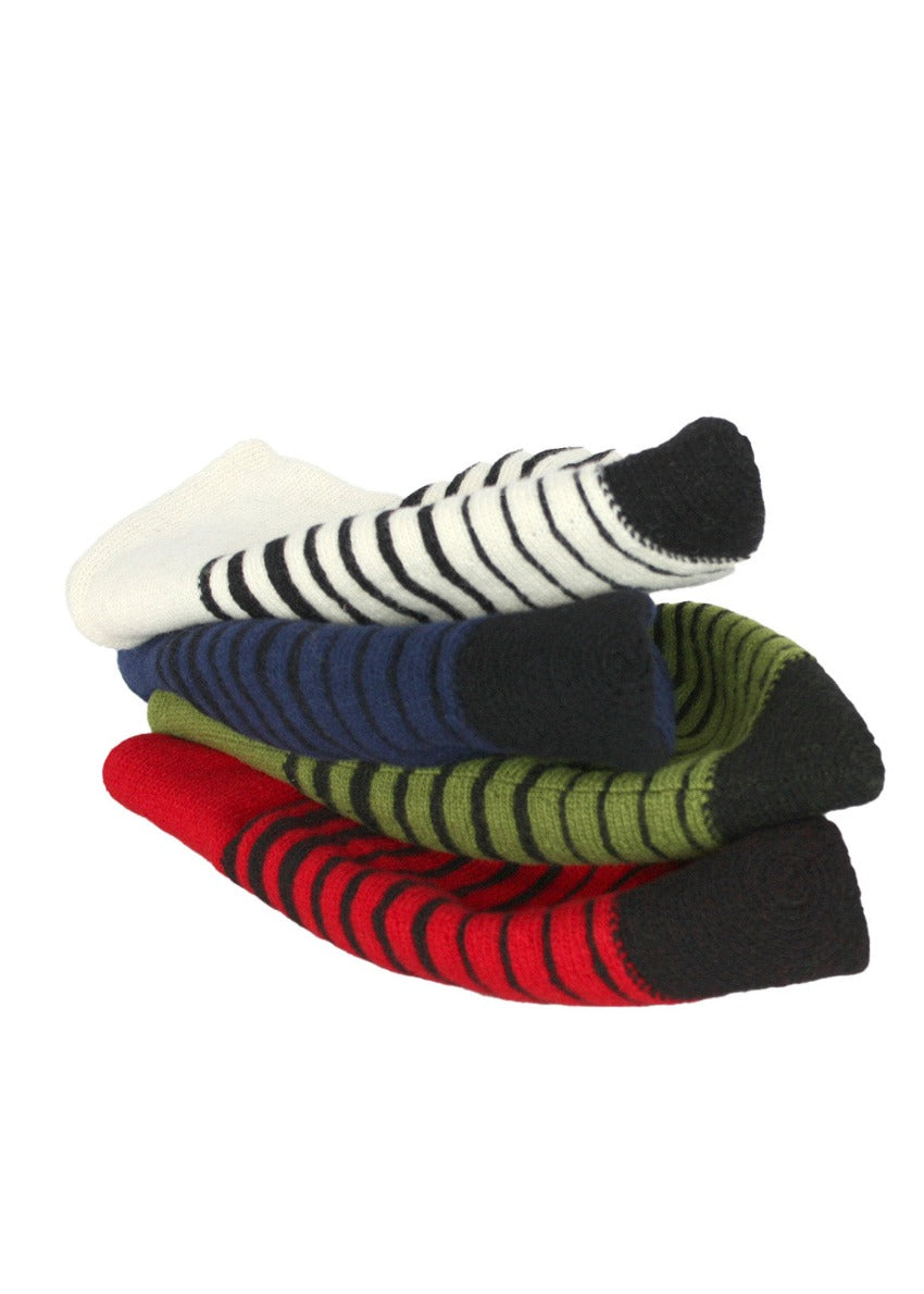 Different colours of ringed stripes beanie on a white background 