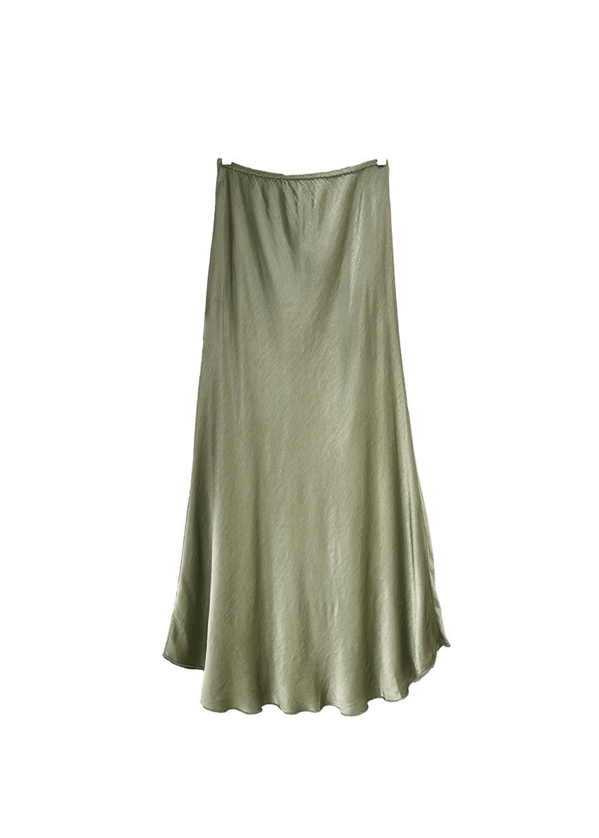 A satin green khaki skirt on a white background 