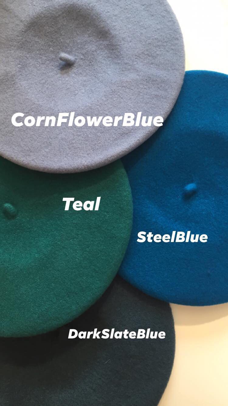 A different shades of blue wool berets