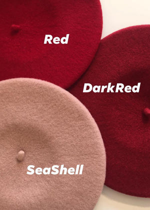 A different shades of red wool berets 