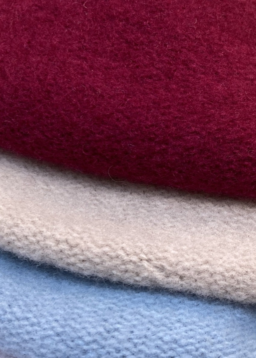 A different colours of a wool conical beret