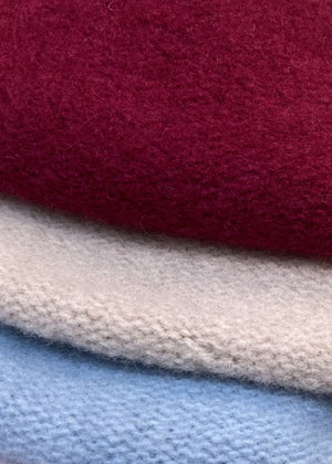 A different colours of a wool conical beret